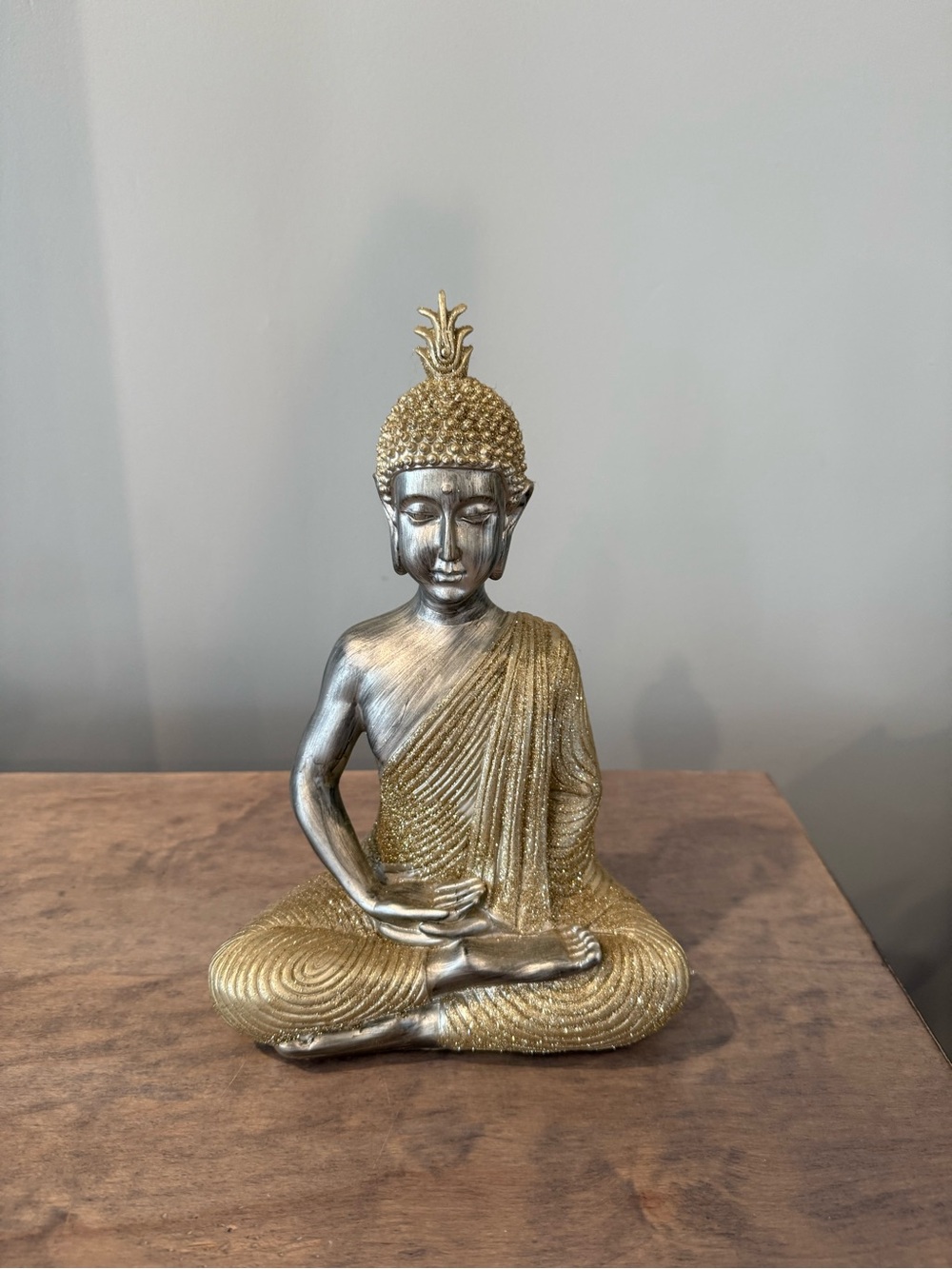 Glittery gold Buddha statue